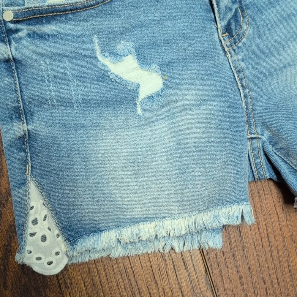 Judy Blue -  Mid Rise Denim Cut Off Shorts With Eyelet Detail - Picture 4 of 6